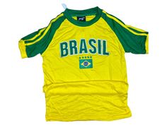 a yellow and green shirt with the word brasil on it