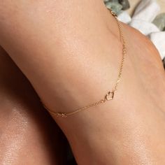 Description: 14k Solid Gold Bow Tie Heart Ribbon Anklet Item No.: M0821 Metal Type: 14k Solid Gold (Stamped 14k) Color: Yellow Gold Measurement: 9"-10" Adjustable. Chain Width: 1mm. Charm Size: 5.5mm. Est. Weight: 1.6 Grams Brand New Made To Order. Please Allow 2-5 Days To Be Shipped Elegant Gold Anklets With Heart Charm, Delicate Chain Yellow Gold Anklet, Yellow Gold Delicate Chain Anklet, Elegant Heart Charm Anklets For Valentine's Day, Delicate Yellow Gold Anklet For Gift, Delicate Yellow Gold Anklet As Gift, Gold Heart Bracelet With Delicate Chain, Yellow Gold Adjustable Chain Anklets As Gift, Elegant Heart-shaped Anklets For Valentine's Day