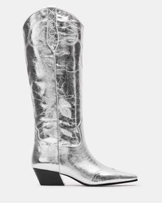 The DOLLIE Western boot offers a sleek and stylish design with a square toe. Experience comfort and durability with every step. Elevate your wardrobe with this timeless and versatile statement piece. 1.75 inch heel height Size 6 measurements: 15 inch shaft circumference, 13 inch shaft height Size 8 measurements: 16 inch shaft circumference, 14 inch shaft height Size 10 measurements: 17 inch shaft circumference, 14.75 inch shaft height Leather upper material Textile and synthetic lining Synthetic Leather Western Boots, Western Boots Women, Western Boot, Leather Silver, Western Boots, Boot Shoes Women, Stylish Design, Womens Boots, Heel Height