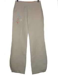 VERY RARE KENZO JUNGLE SUMMER TROUSERS WITH EBROIDERY FABRIC-53% COTTON, 47% LINEN MEASUREMENTS: WAIST-32cm FRONT RISE-28cm INSEAM-74cm LEG OPENING-18cm CONDITION-NEVER WORN Casual Beige Cotton Capris, Fitted Summer Cargo Pants, Ankle-length, Fitted Cotton Cargo Pants For Summer, Summer Casual Fitted Cargo Pants, Casual Fitted Summer Cargo Pants, Casual Fitted Cargo Pants For Summer, Relaxed Fit Mid-rise Summer Capris, Summer Relaxed Fit Mid-rise Capris, Spring Stretch Straight Leg Cargo Pants