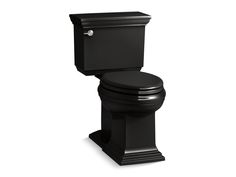 a black toilet sitting on top of a white floor next to a sign that says new