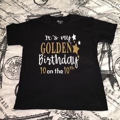 Golden Birthday Shirt! Please see the pictures for sizing, as well as for vinyl colors.  Please note, Newborn sizes only come in white. In the notes section, please include: 1. Vinyl/Writing color(s) preferred (Ex: Gold and White, Gold and Black, Etc.) 2. Age and Name for the Shirt 3. Date needed by **Free Standard Shipping. If you need your item sooner, please choose Priority Shipping during checkout which is an additional $5. If you're unsure which shipping to choose, please send me a message! Black Letter Print Shirt For Birthday, Gold Top With Graphic Print For Birthday, Gold Graphic Print Top For Birthday, Gold Top With Graphic Print, Gold Letter Print T-shirt For Birthday, Gold T-shirt With Letter Print For Birthday, Gold Letter Print T-shirt For Party, Gold Tops With Letter Print For Gifts, Golden Birthday Shirt