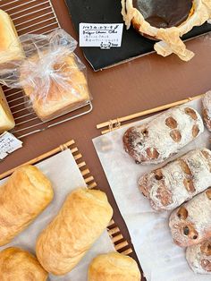 breads and pastries on display at a bakery