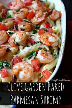 pasta with shrimp and tomatoes in a white dish