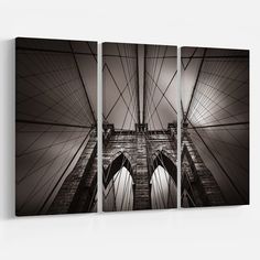 the brooklyn bridge in black and white is featured on this triptych wall art