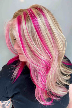 25 Chunky Blonde Highlight Ideas That Are Taking Over Instagram Blonde Hot Pink Hair, Pink Highlights In Blonde Hair Curly, Blonde Hair With Hot Pink Highlights, Blonde Hair With Colorful Highlights, Colored Hair For Blondes, Chunky Pink Highlights In Blonde Hair, Pink Hair Streaks Blonde, Blonde Hair With Pink Streaks, Blonde Hair With Colored Highlights