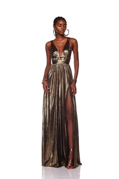 Embrace divine elegance in our Goddess Gown, featuring a captivating deep V-neck and a flattering belted waist. Crafted from lightweight metallic fabric and partially lined for comfort, it boasts a hidden back zipper closure and a mesmerizing split hem, perfect for any special occasion. Bronx And Banco Dresses, Goddess Gown, Bronx And Banco, Gold Maxi Dress, Gown Gold, Gold Gown, Michael Costello, One Shoulder Gown, International Fashion