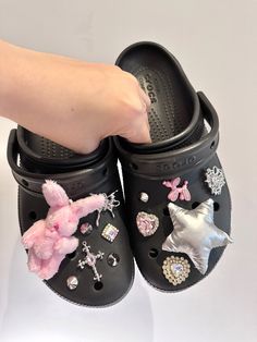 Pink and silver croc jibbitz set Bedazzled Crocs Shoes Pink, Trendy Silver Shoe Charms For Gifts, Crocs Charm Ideas, Croc Design Ideas, Black Crocs With Jibbitz, Jibbitz Bracelet, Crocs Jibbitz Aesthetic, Croc Aesthetic, Jibbitz Crocs Ideas