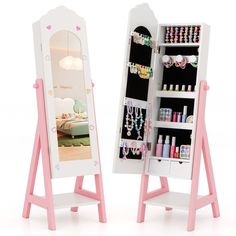 a white and pink doll's dressing table with a mirror