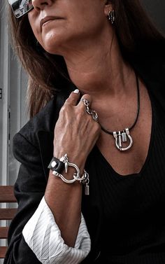 "Chunky equestrian necklace, bracelet and ring set - ideal for your everyday standout looks. Created with Sterling silver plated Zamak metal, genuine black leather and stainless steel chains- designed to make a statement. Get the set at 10% off 1. Necklace details: Large shackle 1.6\"x1.4\" with genuine black leather. Circumference 18\"+2.5\" extension chain 2. Bracelet details: Large shackle (1.6\"x1.4\") with genuine black leather, and heavy stainless steel chain.  - The bracelet is adjustable with extension chain but knowing your approx. wrist size helps me create it to fit you perfectly! Message me for larger. Wrist size: Small 5.5\"-6.5\" / 14CM-16.51 Medium 6.5\"-7.5\" / 16.51CM-19.05CM Large 7.5\"-8.5\" / 19.05CM-21.59 3. Ring: This beautiful piece features 2 adjustable silver-plate Equestrian Necklace, Bracelet And Ring Set, Horseshoe Jewelry, Bracelet And Ring, Chunky Jewelry, Stainless Steel Chain, Necklace Bracelet, Bracelet Sizes, Metal Jewelry