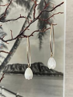 "Hawaiian Mother of Pearl Pikake and 14K Gold Filled or 925 Silver dangle earrings Super popular bridesmaid and wedding gifts for friends and family. Volume discount available on multiple orders 1.75\" long  Natural White mother of pearl Pikake  Handmade V hook  925 Sterling Silver 14K Gold filled 14K Rose Gold filled (new) The White Mother of Pearl is iridescent and reflects light when you move it around. Mother of Pearl is cut from the best part of the shell. Very nice quality.  Made with Aloha. Mahalo and enjoy!" White Threader Earrings With Ear Wire For Gift, White Threader Earrings As A Gift, Dainty Pearl Drop Flower Earrings Gift, White Threader Earrings For Pierced Ears As Gift, Flower Shaped Jewelry With French Hook For Gifts, Rose Gold Dangle Jewelry With Birth Flower Detail, Rose Gold Dangle Jewelry With Birth Flower, Elegant 14k Gold-filled Flower Earrings, Elegant 14k Gold Filled Flower Earrings