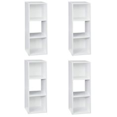 three white bookshelves sitting next to each other