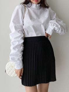 Cotton blouse with high ruffle collar. Ruched balloon-like long sleeves with wide cuff. Model is in MINUSEY ONE SIZE. Please allow 5-12 days shipping when in restocking. * MINUSEY ONE SIZE = EU 34-38, US 2-6* 100% Cotton* Dry clean* Made in Korea - Model Height: 170cm/5'7" (US2, EU34) White Long Sleeve Blouse With Smocked Cuffs, White Blouse With Elastic Sleeves For Fall, Fall White Blouse With Elastic Sleeves, White Long Sleeve Blouse With Pleated Sleeves, White Blouse With Smocked Cuffs And Lantern Sleeves, White Lantern Sleeve Blouse With Smocked Cuffs, White Long Sleeve Tops With Gathered Sleeves, White Balloon Sleeve Tops With Smocked Cuffs, White Balloon Sleeve Top With Smocked Cuffs