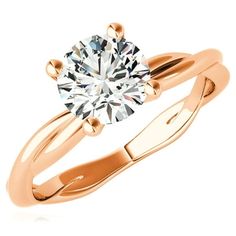 a gold engagement ring with a round diamond in the center and two clawed shans