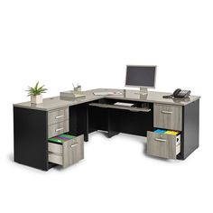 an office desk with two drawers and a computer monitor