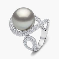 Embrace aristocratic grace with the Duchess Collection. This opulent 18K White Gold ring features a captivating pavé diamond spiral band, encircling a Grey Tahitian Pearl. This ring epitomises timeless allure, destined to elevate your style with the luxury of pearls.  Pearl Size: 14-15mmMetal: 18K White GoldApproximate Diamond Weight: 1.15ct Ring Sizing Information: For additional ring sizes, please click “make an enquiry” above and send us a message. A member of our team will get back to you within one working day. Rare Pearls, Curve Ring, Pearl And Diamond Ring, Pearl Jewellery, Yoko London, Ring Crafts, Pearl Types, Tahitian Pearls, The Duchess