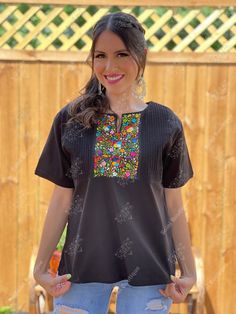 This Beautiful Hand embroidered blouse has a unique and Mexican inspired Floral design. The blouse has a beautiful traditional look to it and is made with fresh Mexican linen. The Jewelry modeled may be purchased here: Filigree Earrings: https://www.etsy.com/es/listing/872372628/filigrana-clasica-de-gota-arete-mexicano?ref=listings_manager_grid Traditional Embroidered Tunic Peasant Top, Folk Peasant Top With Multicolor Embroidered Neckline, Folk Style Short Sleeve Peasant Top With Embroidered Border, Folk Style Peasant Top With Embroidered Border, Traditional Peasant Top With Multicolor Embroidery, Traditional Multicolor Embroidered Peasant Top, Peasant Top With Multicolor Embroidery, Folk Style Peasant Top With Multicolor Geometric Embroidery, Folk Style Embroidered Tunic Top