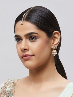 Beautiful kundan jhumka earrings with stones and pearls, plus matching mang tikka Traditional Indian Jewelry: Slight Color variations are possible due to lighting and photography. If you are interested in purchasing this item and have any additional questions about this item, please feel free to email us at nazranaanj@gmail.com. For faster responses, call us at 732-283-1808 or WhatsApp us at 609-852-9922 Care instructionsKeep Jewelry away from direct heat, water, perfumes, deodorants and other s Manga Tikka, Kundan Jhumka Earrings, Kundan Jhumka, Earrings With Stones, Tikka Jewelry, Mang Tikka, Traditional Indian Jewellery, Big Pearl, Pearl Earring