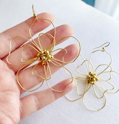 Flower Statement Earrings Handworked Modern Floral Giant Daisy Jewelry Handmade Large Wire Earrings - Etsy Rose Gold Flower-shaped Metal Earrings, Metal Earrings With Flower Charm For Party, Metal Party Earrings With Flower Charm, Gold Drop Earrings For Spring, Gold Metal Flower Charm Earrings, Gold Metal Earrings With Flower Charm, Gold Flower-shaped Earrings For Spring, Spring Gold Flower-shaped Earrings, Gold Metal Jewelry For Spring