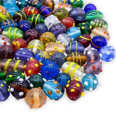 a pile of colorful glass beads sitting on top of each other