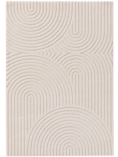 a white rug with wavy lines on the bottom, and an oval pattern in the middle