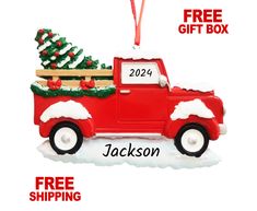 a red truck with a christmas tree on the back is featured in this ornament