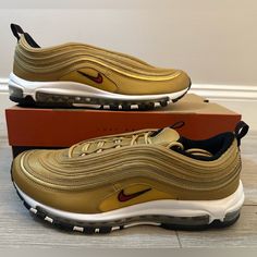 Selling: 2023 Men's Nike Air Max 97 Og 'Gold Bullet' Metallic Gold / Varsity Red - White - Black Size 12 Shoes New Style #: Dm0028-700 Shoes Are 100% Authentic And Brand New With Box. Retail: $185.00+ Tax $175.00 Buy It Now Nike Gold Sneakers With Cushioned Footbed, Gold Air Max Sneakers For Streetwear, Gold Sneakers With Air Max Cushioning For Streetwear, Gold Sneakers With Air Cushioning For Sports, Gold Low-top Running Sneakers, Gold Sporty Running Sneakers, Gold Casual Sneakers With Air Max Cushioning, Casual Gold Sneakers With Air Max Cushioning, Nike Air Max Trainers