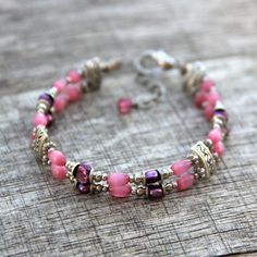 The bracelet is handmade using fresh water pearl and cateye. The fuchsia is a lively and feminine color, a nice blend of passion and tenderness The length of the earrings is 7-8 ¼ inches, 18-21. (excluding the length of hook) For matching earrings, please go to1: https://www.etsy.com/listing/95985512/earrings- For matching earrings, please go to2: https://www.etsy.com/listing/151339368/earrings?ref=shop_home_active For matching necklace, please go to: https://www.etsy.com/listing/118410657/neckl Elegant Pink Nickel-free Bracelets, Elegant Pink Hypoallergenic Beaded Bracelets, Elegant Pink Hypoallergenic Bracelet, Pink Hypoallergenic Jewelry Gift For Her, Hypoallergenic Pink Jewelry Gift For Her, Delicate Pink Bracelets For Jewelry Making, Pink Round Beads Jewelry For Bridesmaid Gift, Delicate Pink Pearl Bracelet For Gift, Delicate Pink Pearl Bracelet As A Gift