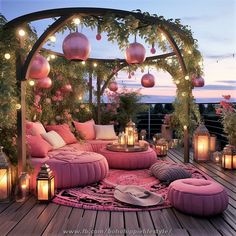 an outdoor seating area with lights and lanterns