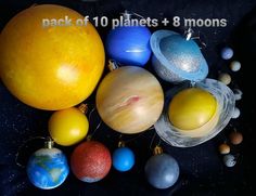 the solar system with eight planets and 8 moons on black background, text reads pack of 10 planets + 8 moons