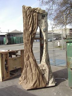 a large piece of wood sitting on top of a cement slab