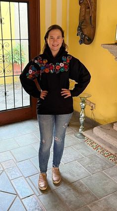 Each sweatshirt is a unique piece so the embroidery may vary. This beautiful sweatshirt is hand embroidered by Mexican artisans. It's great for keeping you warm in cold weather. It has a beautiful multi-colored floral embroidery. Sweatshirt has a kangaroo pouch on the front. We ship anywhere in the word, from Tepic, Nayarit,  mx. Made by artisans from Oaxaca, mx Spring Embroidered Hoodie Sweatshirt, Embroidered Black Hoodie For Fall, Black Embroidered Hoodie For Fall, Black Embroidered Cotton Sweater, Black Cotton Embroidered Sweater, Casual Hooded Sweatshirt With Machine Embroidery, Casual Hooded Hoodie With Machine Embroidery, Casual Long Sleeve Hoodie With Machine Embroidery, Casual Multicolor Embroidered Sweatshirt