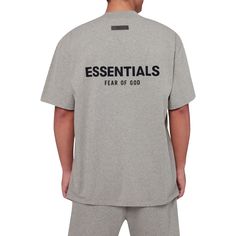 Enhance Your Wardrobe With The Fear Of God Essentials Tee For Spring/Summer 2022. This Contemporary Top Is Constructed From A Dark Oatmeal Grey Tone. Showcasing A Relaxed Fit And Minimalist Design, This T-Shirt Is Perfect For Any Occasion. Brand : Fear Of God Essentials Colorway : Dark Oatmeal Release Date : 06/15/2022 Style Code : 125bt212063f Material : Cotton We Are An Authorized And Trusted Dealer Of Top Designer Brands Of Clothing, Footwear, And Accessories. We Offer A Wide Range Of Product Summer Loungewear Top With Logo Print, Summer Relaxed Fit Shirt With Logo Print, Essential Summer Crew Neck Top, Essential Relaxed Fit Summer Tops, Logo Print Short Sleeve Tops For Loungewear, Short Sleeve Logo Print Tops For Loungewear, Essential Cotton Top With Letter Print, Summer Relaxed Fit T-shirt, Relaxed Fit Logo Print Top