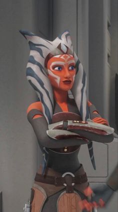 an animated star wars character holding a plate