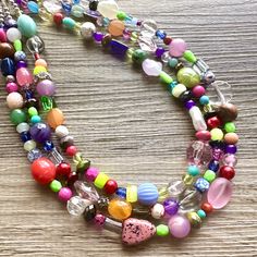 💞One of a kind & ready to ship💞  16 Inch Necklace (at shortest part) with a 4 inch silver extender chain and silver lobster clasp. A variety of rainbow acrylic and glass beads. Sure to make a BIG statement! Thank you for supporting American small business! *Smoke and pet free home!* I ship 6 days a week! This particular necklace is READY TO SHIP! Thank you for browsing my store! Check out my other items here: https://www.etsy.com/shop/PolkaDotDrawer?ref=si_shop Colorful Funky Jewelry, Funky Round Beads Jewelry As Gift, Funky Round Beads Jewelry For Gifts, Multicolor Necklace With Lobster Clasp For Party, Playful Colorful Jewelry For Jewelry Making, Funky Adjustable Colorful Jewelry, Colorful Beads Jewelry Gift, Playful Bright Colored Jewelry Gift, Multicolor Funky Jewelry For Festivals