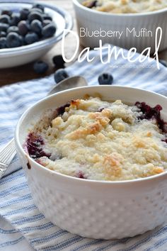 blueberry muffin oatmeal is in a white bowl on a table