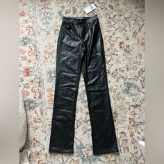 Zara High Waisted Leather Pants Size: Us 2. Slits At The Bottom Of The Opening Of The Pant Leg. Fleece Inside. Working Pockets. Zipper And Button Front Closure. Never Before Worn. New With Tags. Sleek Wide Leg Leather Pants For Going Out, Trendy Non-stretch Straight Leg Leather Pants, Trendy Wide Leg Leather Pants For Date Night, Trendy Non-stretch Leather Pants, Fitted Leather Bottoms For Date Night, Trendy Leather Pants For Date Night, Fitted Leather Pants For Date Night, Straight Leg Faux Leather Pants For Going Out, Faux Leather Straight Leg Pants For Going Out