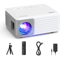 an image of a projector that is on the ground with other items around it