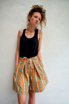 "High waist summer skorts, 60s 70s bohemian shorts, striped hippie shorts, festival wear, M 100% cotton high waist summer skorts. Two side pockets and one more on the bottom. Thick and strong fabric. Size: seems like women's (M) PLEASE CHECK ALL MEASUREMENTS BELLOW: Length: 50cm / 20\" Waist: 70 cm / 28\" Hips: 170 cm / 67\" Inseam: 16 cm / 6\" Fabric: 100% cotton Brand: Mexx Condition: excellent * Wash at temperature not higher than 30oC / 86oF KEEP IN MIND: Photo might be slightly different fr Hippie Beach Shorts For Summer, Hippie Beach Shorts For Spring, Bohemian Style Short Shorts For Summer, Bohemian Style Summer Shorts, Retro Cotton Shorts With Elastic Waistband, Retro Knee-length Shorts For Summer, Bohemian Shorts With Pockets For Summer, Retro High-waisted Shorts For Summer, Retro Summer Shorts