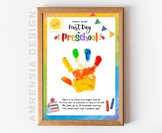 a colorful poster with the words first day of preschool written on it in front of a white background