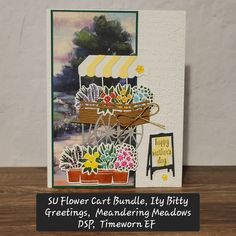 a card with flowers and a cart on the front that says, su flower cart bundle, itty bitty greetings, meandering meadow meadows