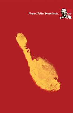 a red poster with yellow paint on it