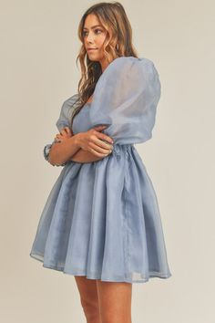 This sweet babydoll mini dress is a swirling romantic dream. It features oversized 3/4 puffy sleeves, an empire waist, and a full, floaty skirt. Pair this sweet mini with some heels for a look that's party ready. Specifications 100% tencel 100% polyester lining 3/4 length sleeves Elastic shoulders and cuffs Invisible back zipper with hook-and-eye closure Hand wash cold; do not bleach; hang to dry; dry clean for best results Formal Babydoll Dress, Romantic Dream, Babydoll Mini Dress, Dream It, Puffy Sleeves, Hook And Eye, Babydoll Dress, Empire Waist, Baby Dolls