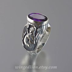 GUARDIAN ANGELS Mens silver ring with Amethyst sizes by WingedLion Spiritual Winged Sterling Silver Jewelry, Elegant Winged Rings As Gifts, Elegant Winged Rings For Gifts, Elegant Sterling Silver Winged Rings, Engraved Silver Amethyst Ring In Sterling Silver, Mens Silver Ring, Jewels Rings, Guardian Angels, Mens Silver Rings