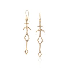 the gold earrings are designed with an intricate design, and features a long hook on each end