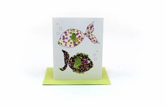 a card with fish and bubbles on it