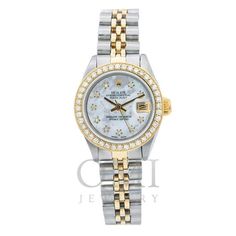 Condition  Pre-Owned Model - Rolex Lady-Datejust Reference Number - 6917 Movement  Automatic Bezel - Yellow Gold Custom Aftermarket Diamond Bezel Total Carat Weight - 0.90 CT Dial - White MOP Custom Aftermarket Diamond Dial Case Size  26mm Crystal - Scratch-resistant Sapphire Crystal Bracelet - Stainless Steel and Yellow Gold Jubilee Bracelet Gender  Women's Box - Rolex Box Size: One Size.  Color: Metal Type.  Gender: male.  Age Group: adult. Bills Paid, Bill Pay, Rolex Diamond, Buy Rolex, Women Boxing, Bezel Diamond, Crystal Bracelet, Sapphire Crystal, Crystal Bracelets