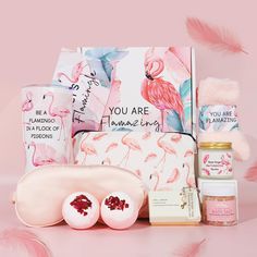 the pink flamingo hamper gift set is shown in front of a pink background