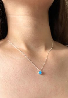 Dainty Opal Silver Necklace - Blue or White Opal Adjustable size from 15" -17.5" Adjustable size from 38cm to 45cm  O P A L  N E C K L A C E Looking to add some charm to your neckline? Check out this stunning Bezel Opal Necklace! With its delicate opal charm, it's the perfect accessory for any occasion.  Rock your everyday style, this minimal necklace will elegantly highlight your neck and décolletage. Get ready to shine and create memorable moments with this beautiful piece! * Material: High Quality 925 Sterling Silver, Opal * Finish: Sterling Silver * Featuring a 5mm x 5mm Bezel CZ Diamond pendant with an adjustable chain 15  inches to 17.5 inches. Please note that the colours of the products displayed on our website may appear differently on different screens and devices due to various Dainty Sterling Silver Necklaces With Simple Design, Delicate Sterling Silver Necklace With Simple Design, Minimalist Sterling Silver Birthstone Necklace For Jewelry Making, Blue Sterling Silver Necklace With Delicate Chain, Sterling Silver Necklace With Simple Design As Gift, Minimalist Sterling Silver Birthstone Necklace, Delicate Sterling Silver Birthstone Necklace With Clavicle Chain, Tiny Round Sterling Silver Necklace, Tiny Sterling Silver Necklace