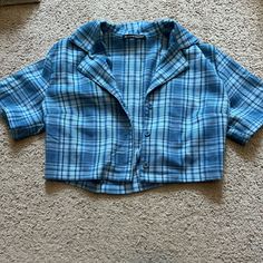 Rare Brandy Cropped Blue Plaid Button Up. Never Worn Perfect Condition! Blue Button-up Tops With Buttons, Blue Button-up Top With Snap Buttons, Blue Snap Button-up Tops, Trendy Blue Collar Tops, Trendy Blue Tops With Snap Buttons, Plaid Button-up Tops With Buttons, Blue Top With Collar And Placket, Trendy Blue Shirt With Button Closure, Blue Collared Top With Snap Buttons